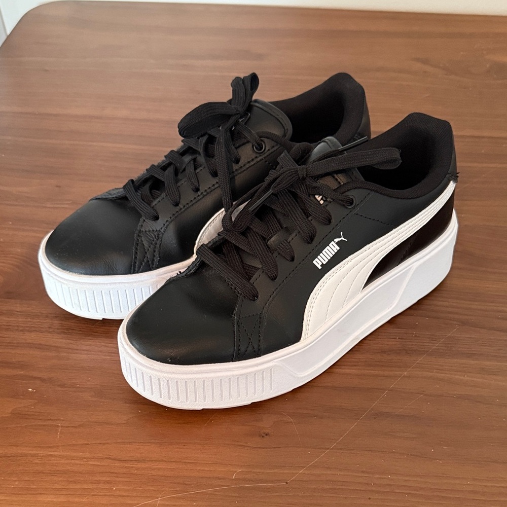 Puma black leather platform sneakers